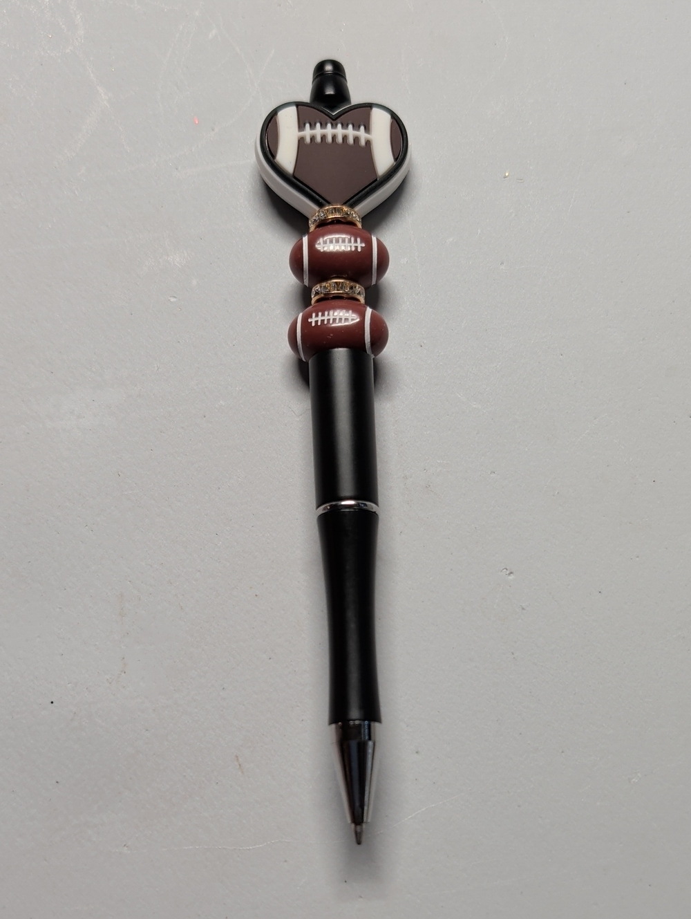 Hand Crafted Black and Brown Football Heart Pen